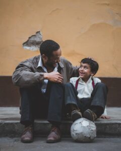 Dad and son, soccer